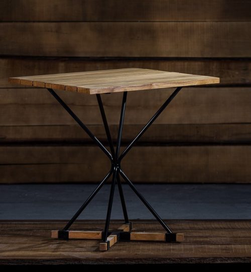 A closeup of a loft-style foldable table